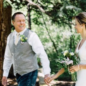 couple walking during outdoor wedding