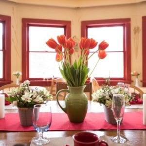 flowers decorate the dining table