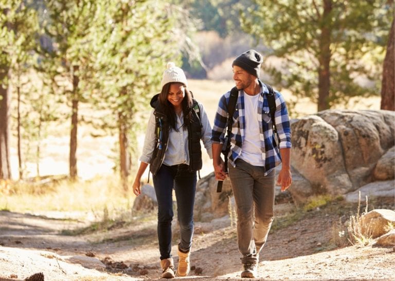 couple walking in the woods