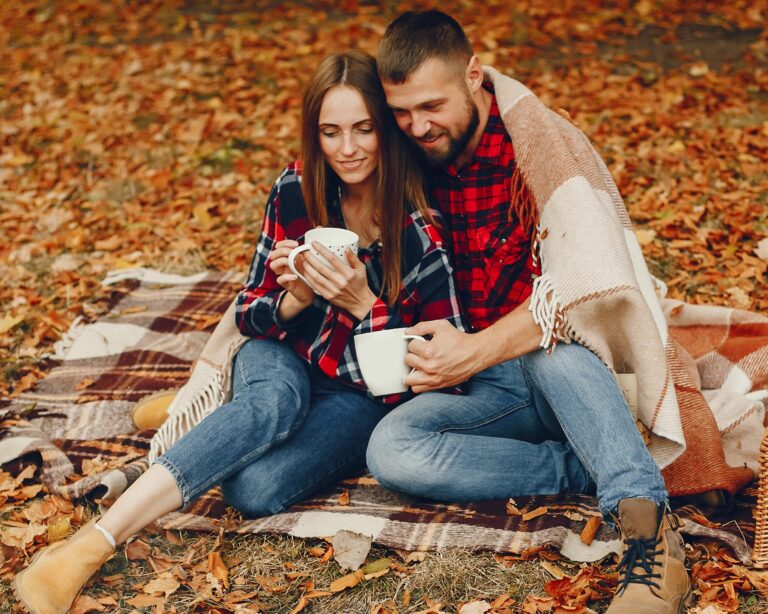 couple enjoying tea outdoors at romantic marriage retreat